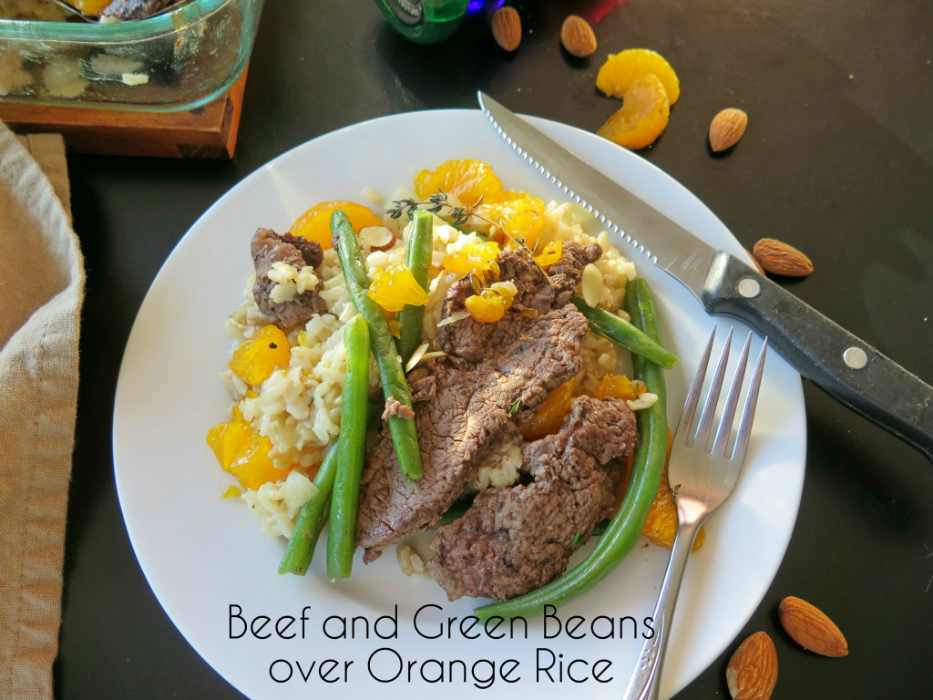 Beef and Beans Over Orange Rice plate