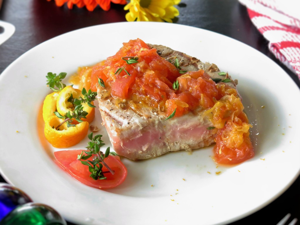 tuna steak and orange tomato sauce