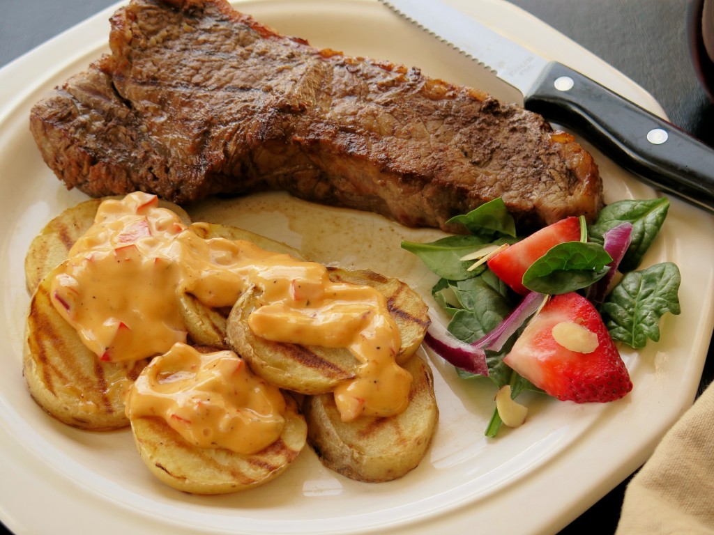 Tangy Tomato Chai Steaks with Saucy Grilled Spuds