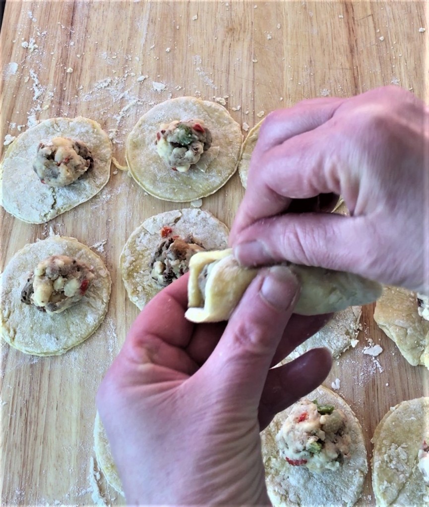 Pinching pierogie shut